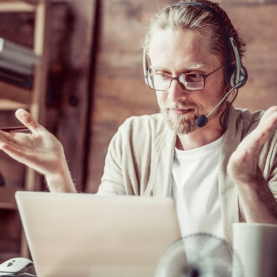 man looking at computer
