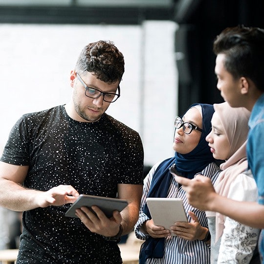 People looking at screen