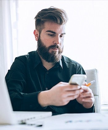 man using his phone