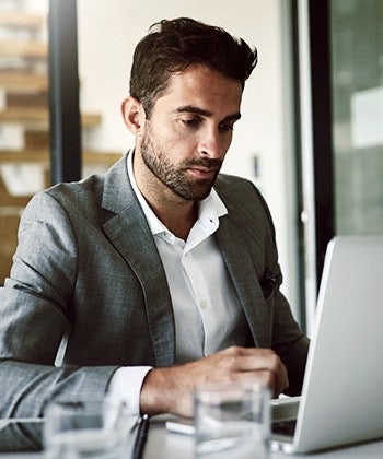 man looking at computer