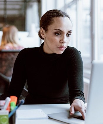 person looking at computer