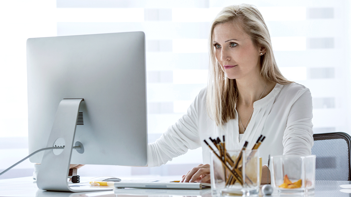women looking at computer screen