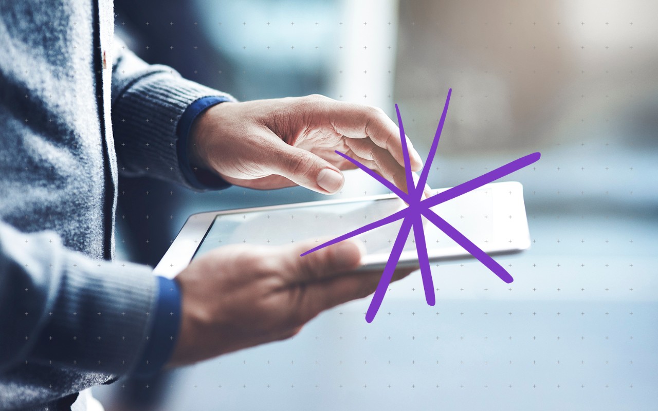 man with finger on tablet