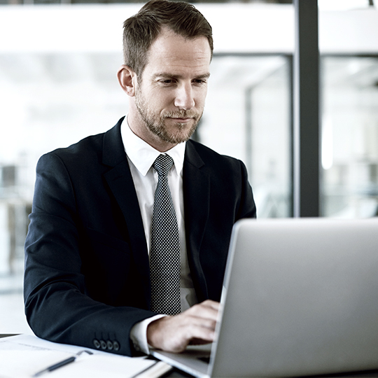 man looking at computer