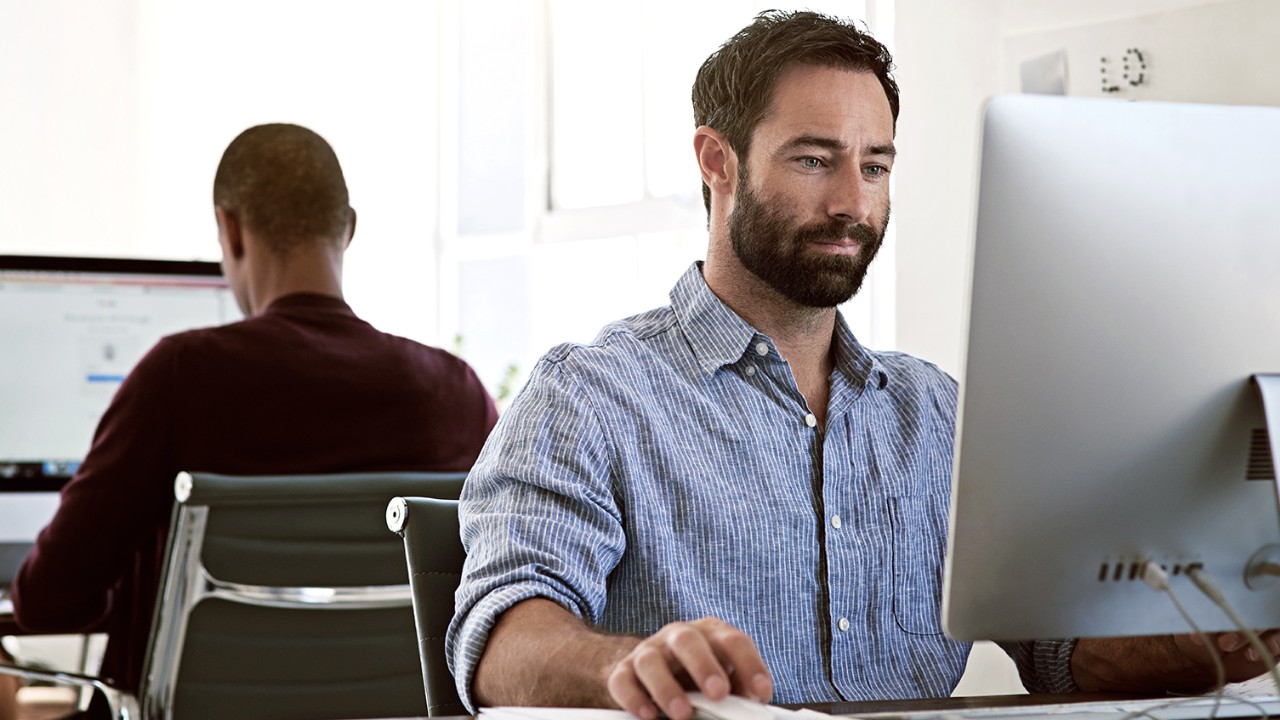 Man looking at computer screen