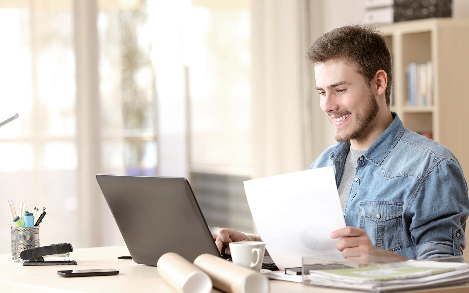 man looking at computer