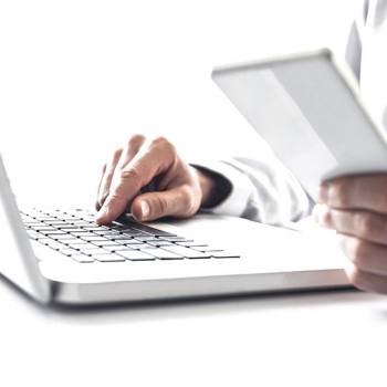 Data Processing Terms and Conditions hands typing in a laptop