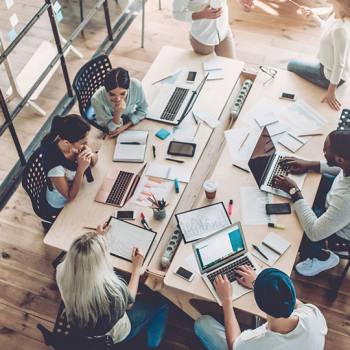 Gaining the Upper Hand: What are Content Services? overhead group meeting