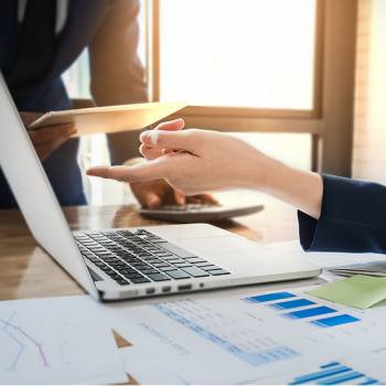 End User License Agreement (EULA) hands pointing a laptop