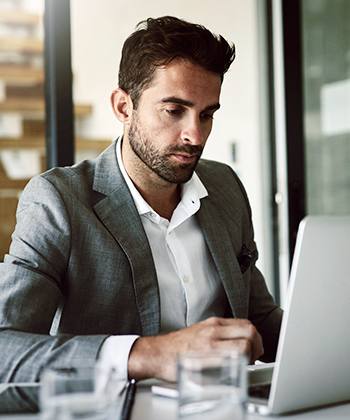 Control man looking at computer