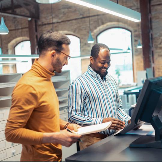 Take your print business to the next level two people talking