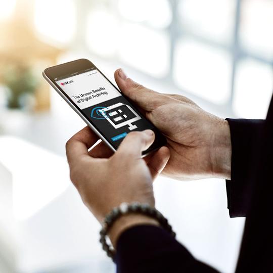 Read the new whitepaper now man watching smartphone